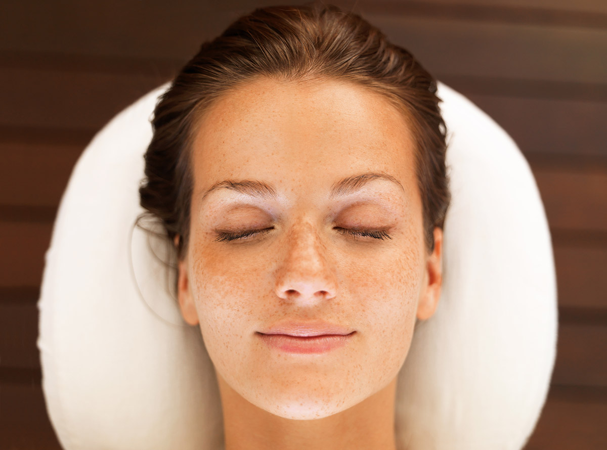Closeup portrait of a beautiful young woman enjoying a spa day and daydreaming